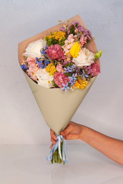 Wrapped flower bouquet, available for delivery from Verbena in Austin, Texas.