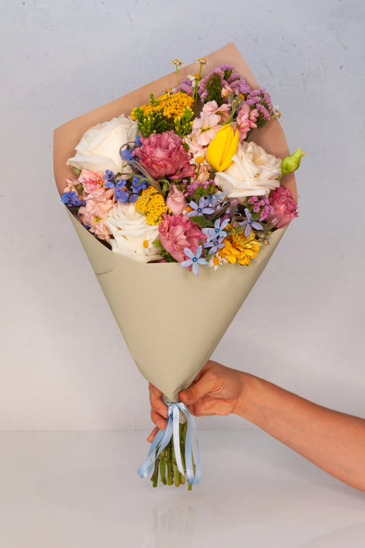 Wrapped flower bouquet, available for delivery from Verbena in Austin, Texas.