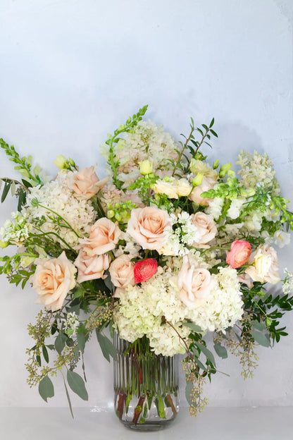 Tall garden-style flower arrangement